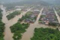 Imagem colorida mostra alagamento por causa da forte chuva em Joinville - Metrópoles